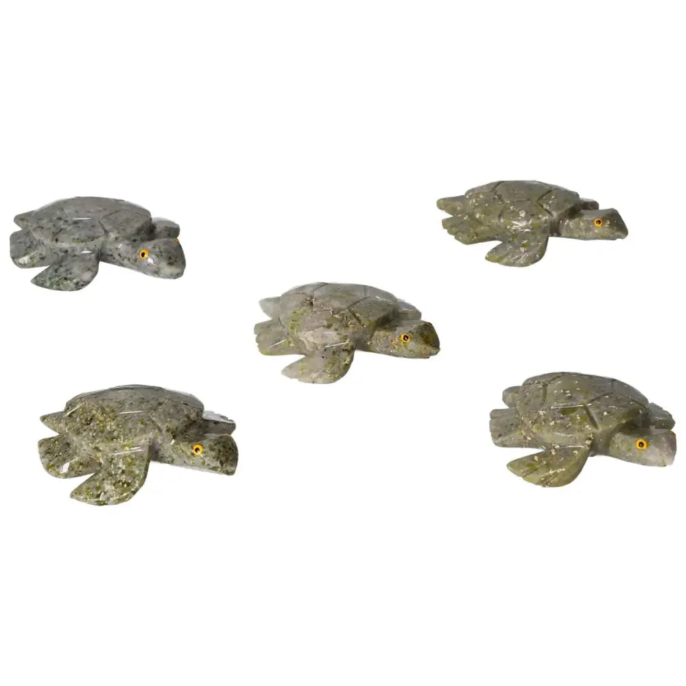 Group of carved dolomite turtle figurines showcasing natural patterns, ideal for decor and emotional balance, from Sylvia Crystals.