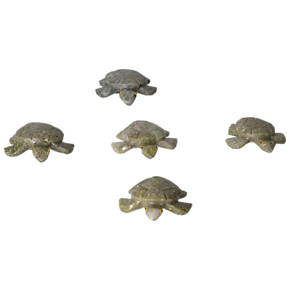 Carved Dolomite Turtle figurines displayed on white background, embodying tranquility and emotional balance with natural beauty.