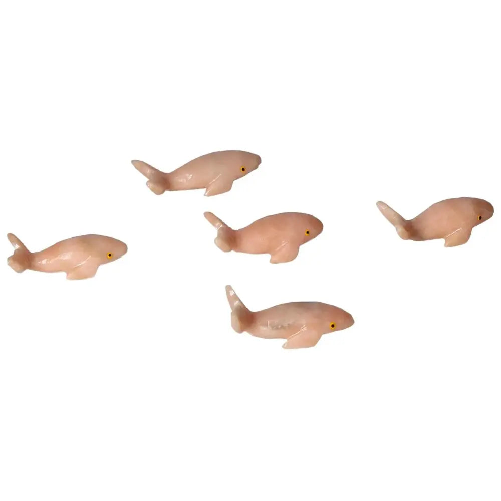 Carved Dolomite Whale figurines by Sylvia Crystals, showcasing elegant craftsmanship for home or office decor.