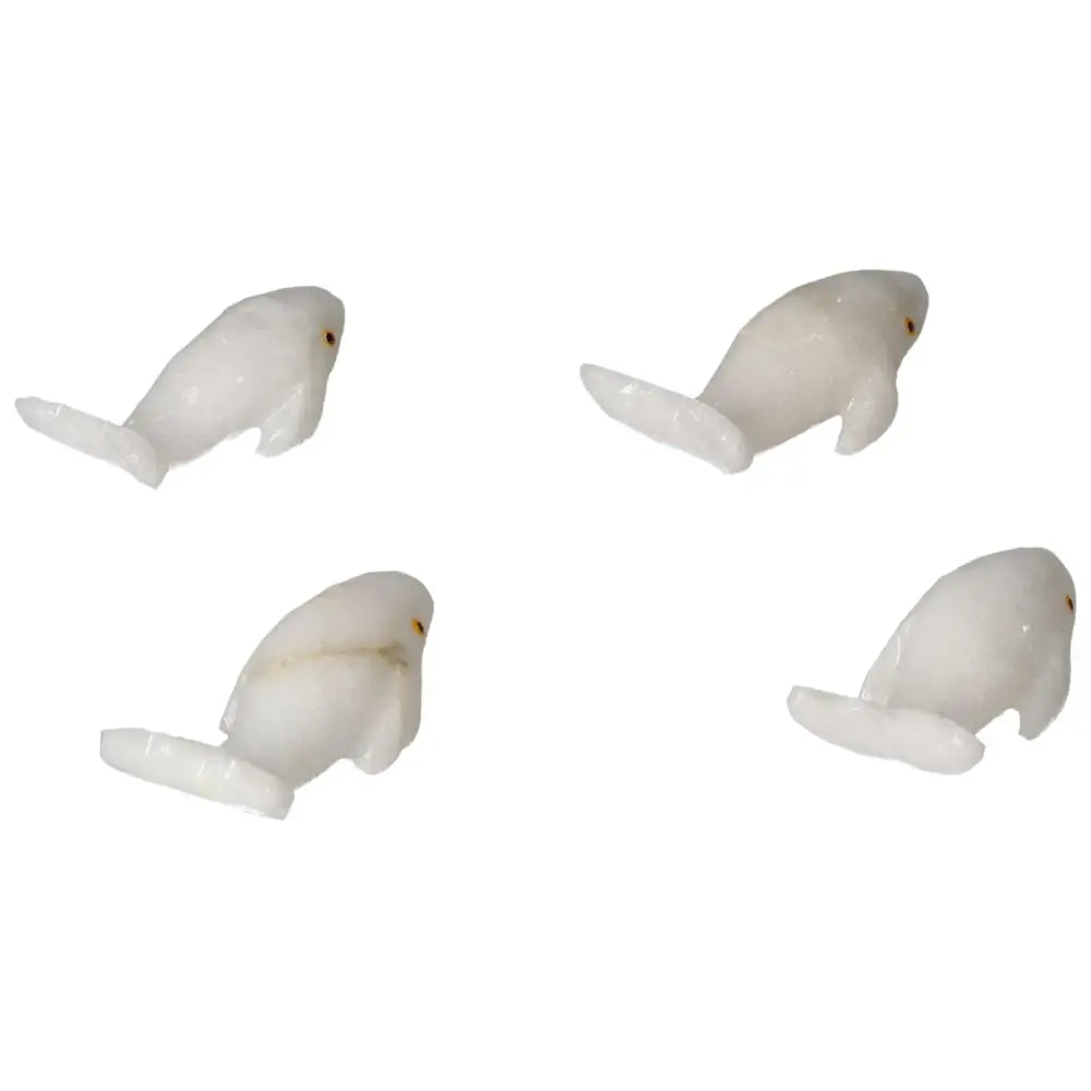 Handcrafted Carved Dolomite Whales symbolizing peace and balance from Sylvia Crystals, made from premium calming dolomite.