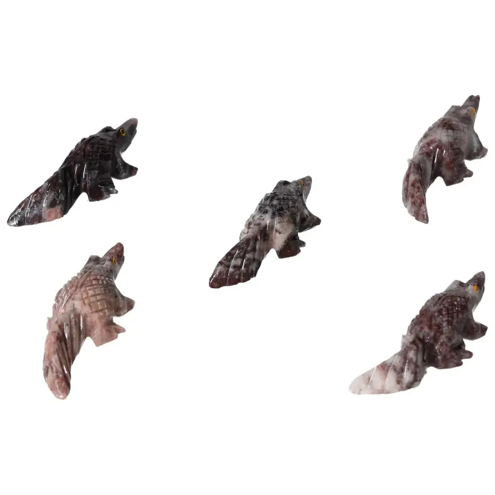 Assorted Carved Magnesite Alligator Ornaments from Sylvia Crystals, offering calming energy and artistic beauty.