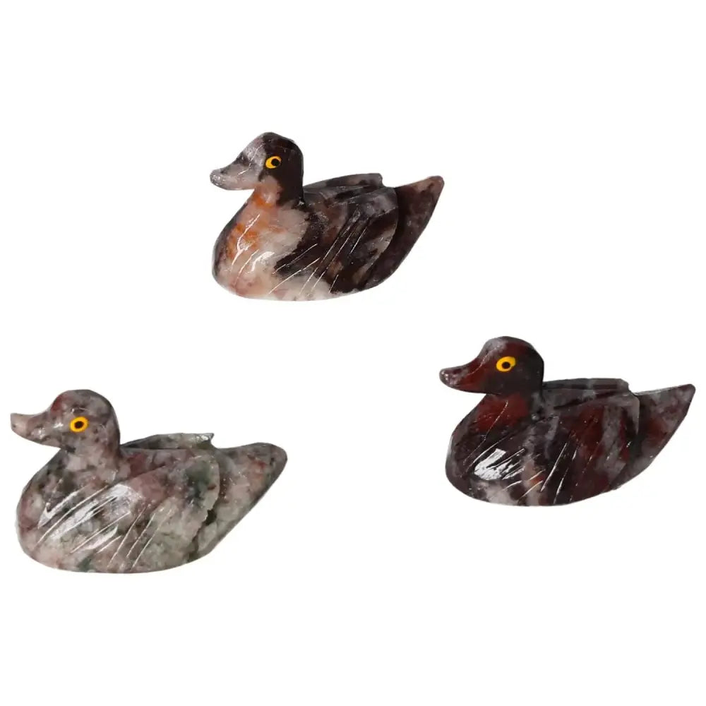Hand-carved magnesite duck sculptures for meditation, promoting serenity and elegance in home decor.