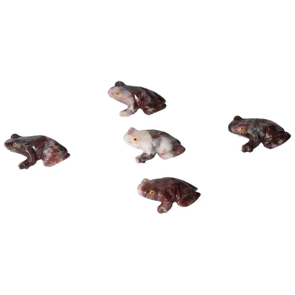 Carved magnesite frog sculptures by Sylvia Crystals, showcasing tranquility and luxury, crafted from high-quality magnesite materials.