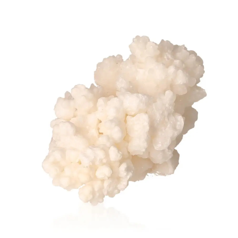 Cave Calcite Stalactite Cluster - natural intricacies of mineral formations, showcasing textured layers and growth in white.