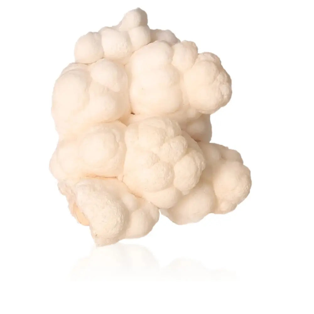 Cave calcite stalactite cluster showcasing intricate formations and textures, symbolizing natural beauty and patience.