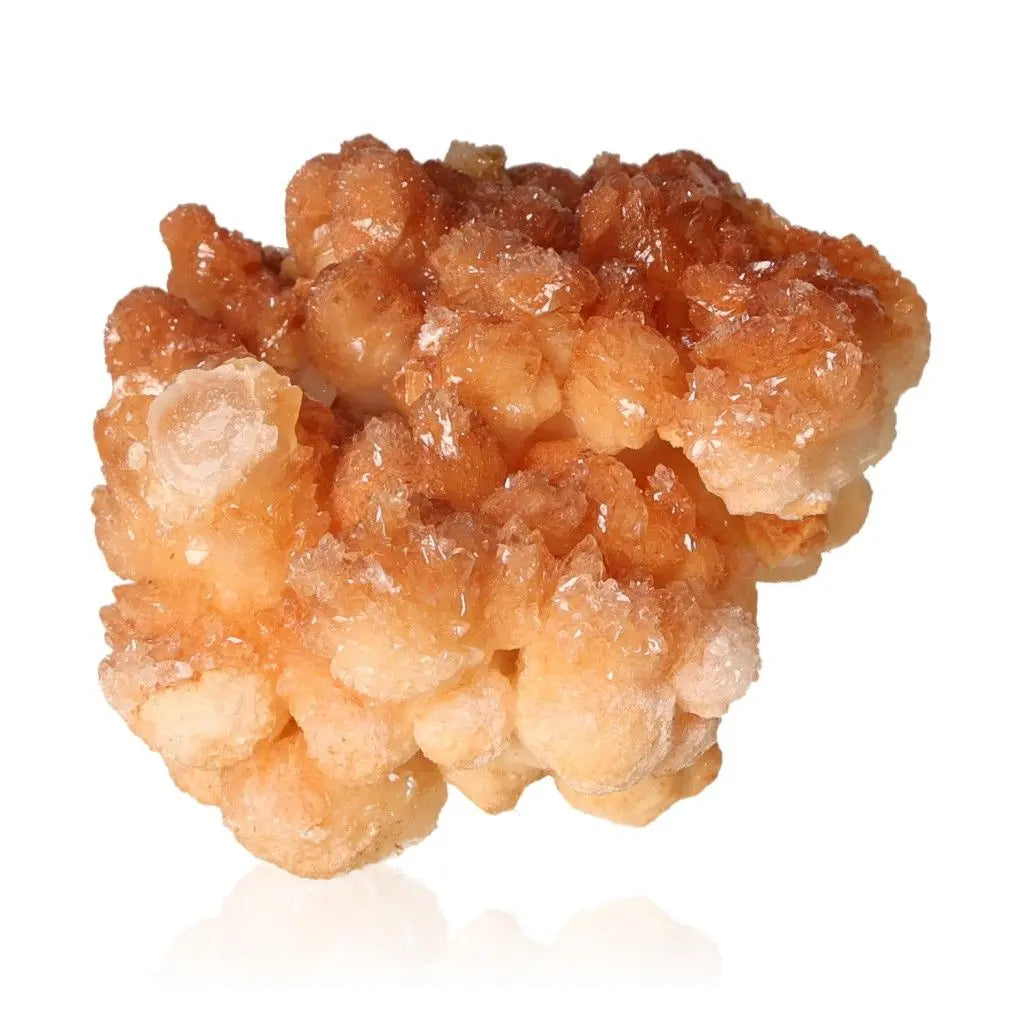 Cave Calcite Stalactite Cluster showcasing natural mineral formations with intricate, layered textures against a white background.