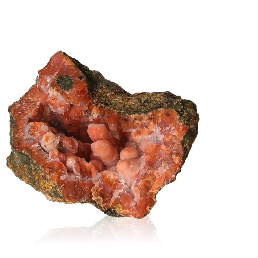 Chalcedony Stalactite crystal from Sylvia Crystals, featuring rich red hues, symbolizing spirituality and luxury in contemporary design.