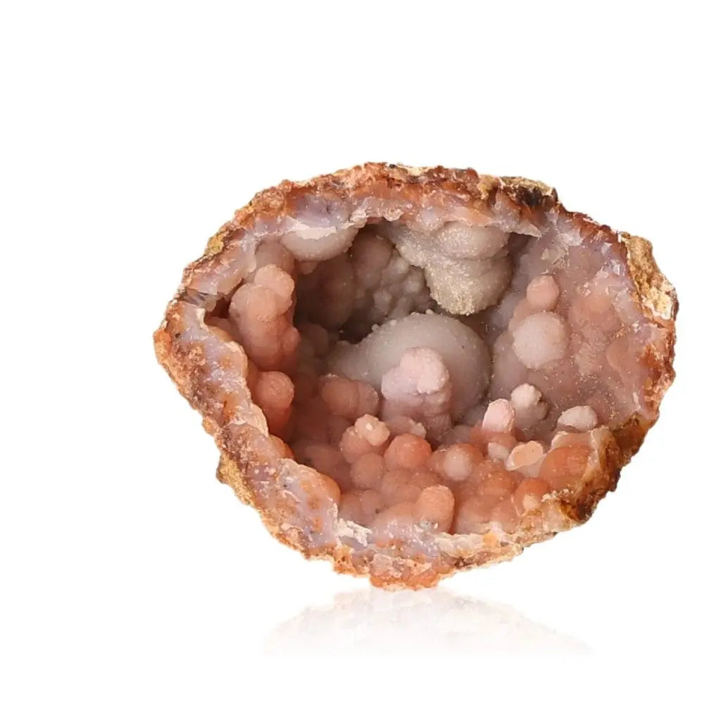 "Chalcedony Stalactite crystal with pink hues from Sylvia Crystals, symbolizing growth and transformation in luxury and spirituality."