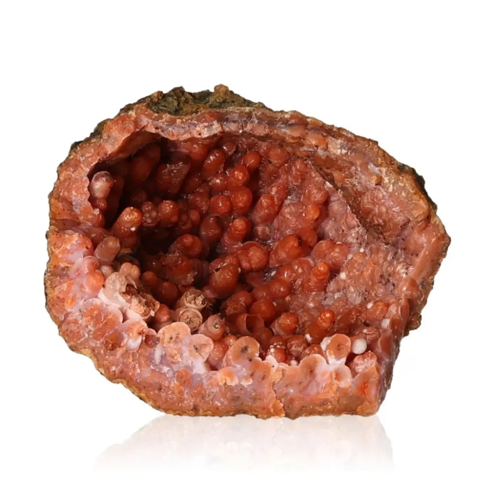 Chalcedony Stalactite crystal showcasing vivid red hues and intricate natural formations, representing a fusion of nature and spirituality.