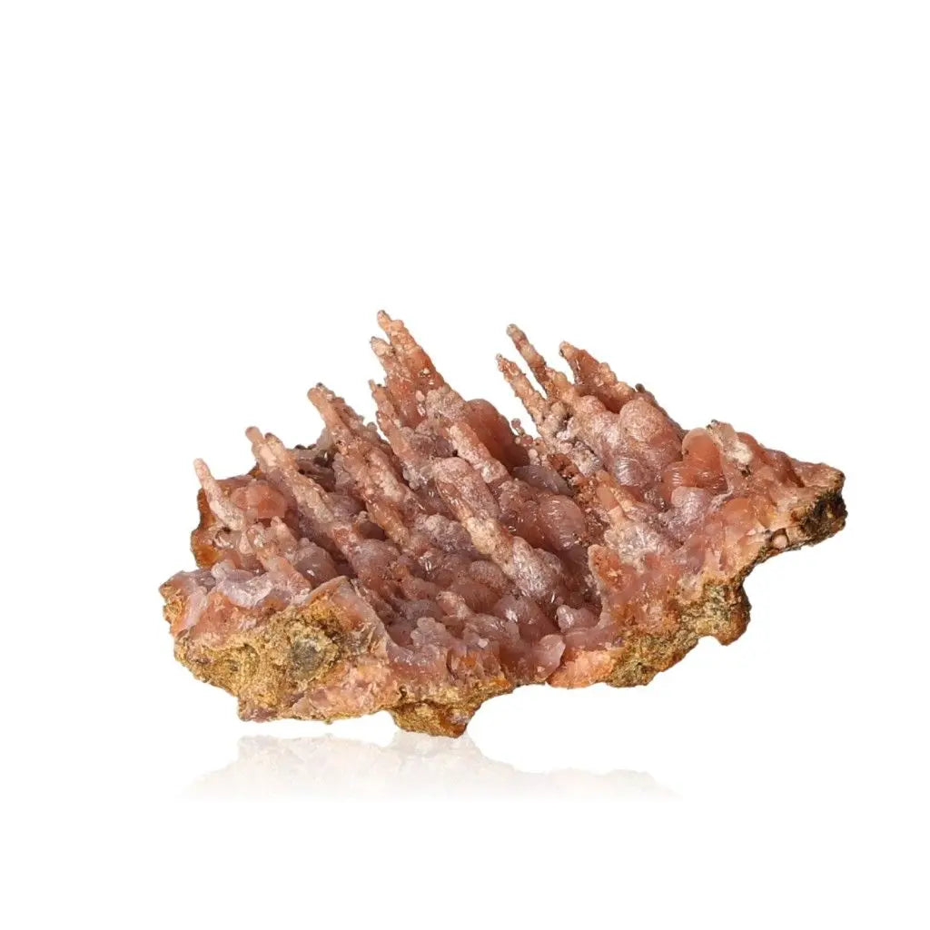 Chalcedony stalactite with intricate layers and earthy tones, representing spiritual growth and natural beauty from Sylvia Crystals.