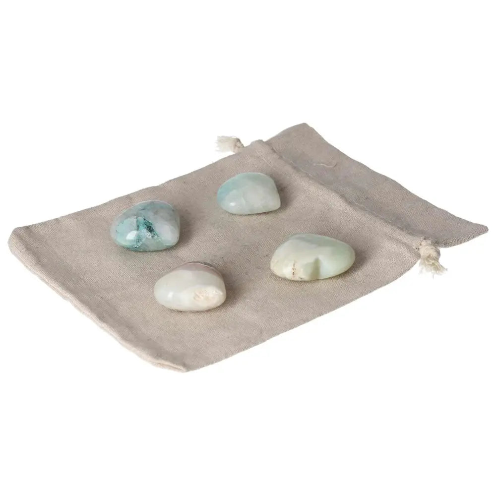 Chrysocolla Heart stones on a pouch, empowering communication and femininity.