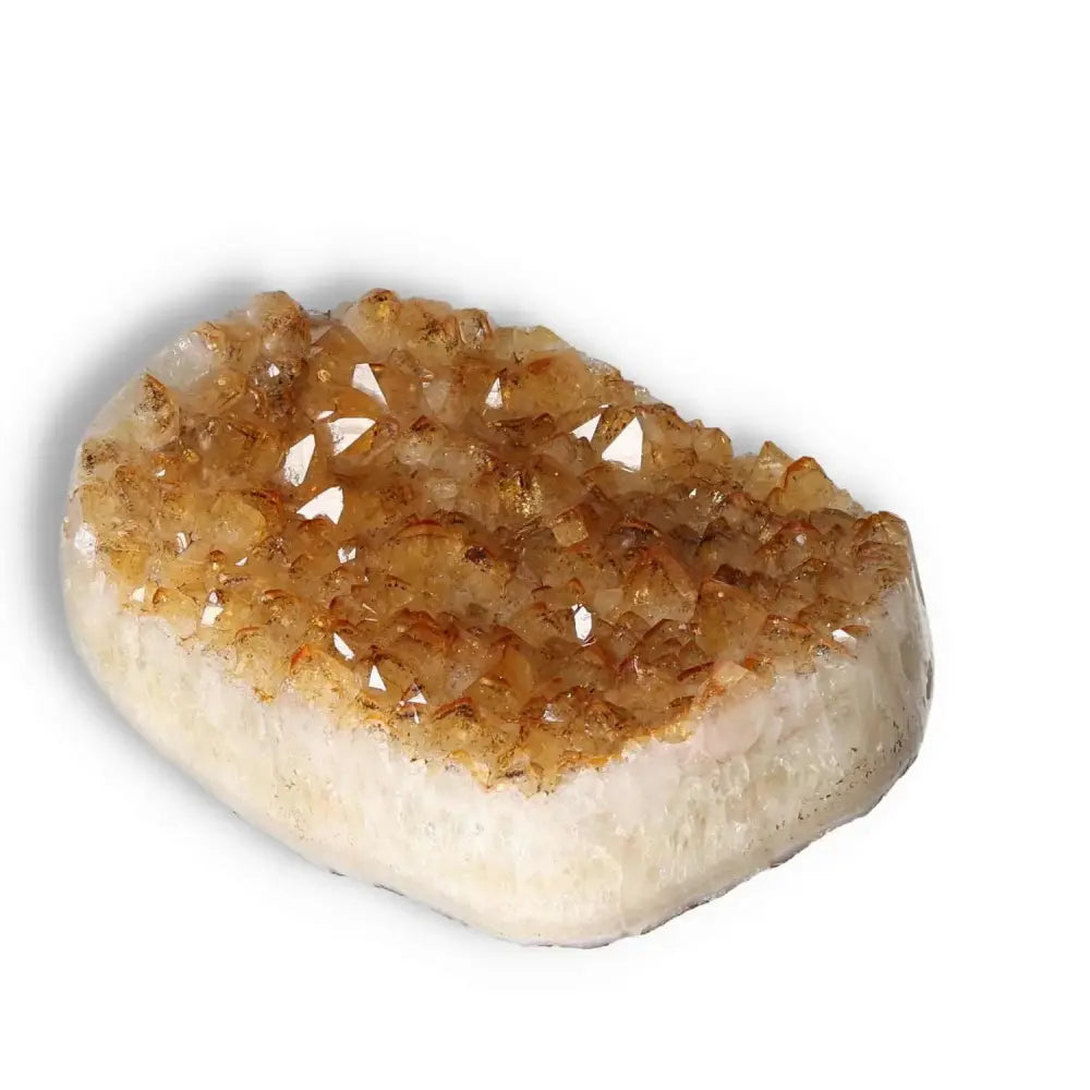 Citrine Druze crystal from Sylvia Crystals, showcasing its vibrant energy and inspiring golden hues, symbolizing positivity and new ventures.