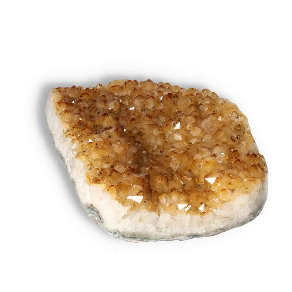 Citrine Druze crystal from Sylvia Crystals, symbolizing positivity and abundance, ideal for luxury and conscious living.