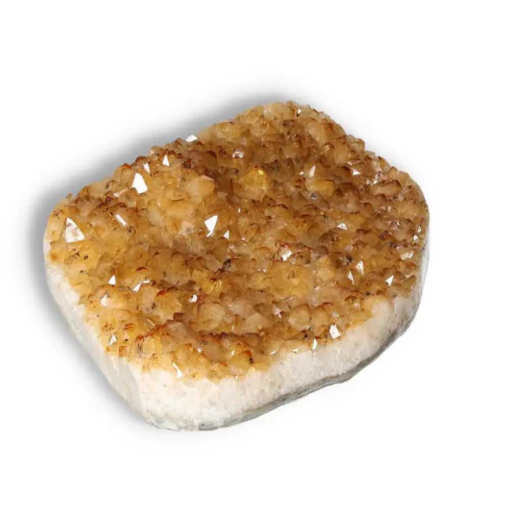 Luxury Citrine Druze from Sylvia Crystals, a vibrant gemstone promoting positivity and abundance, enhances conscious living decor.