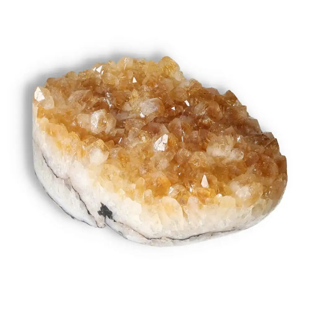 Citrine Druze crystal with vibrant orange-yellow hues, ideal for inspiring creativity and new ventures. Premium quality from Sylvia Crystals.