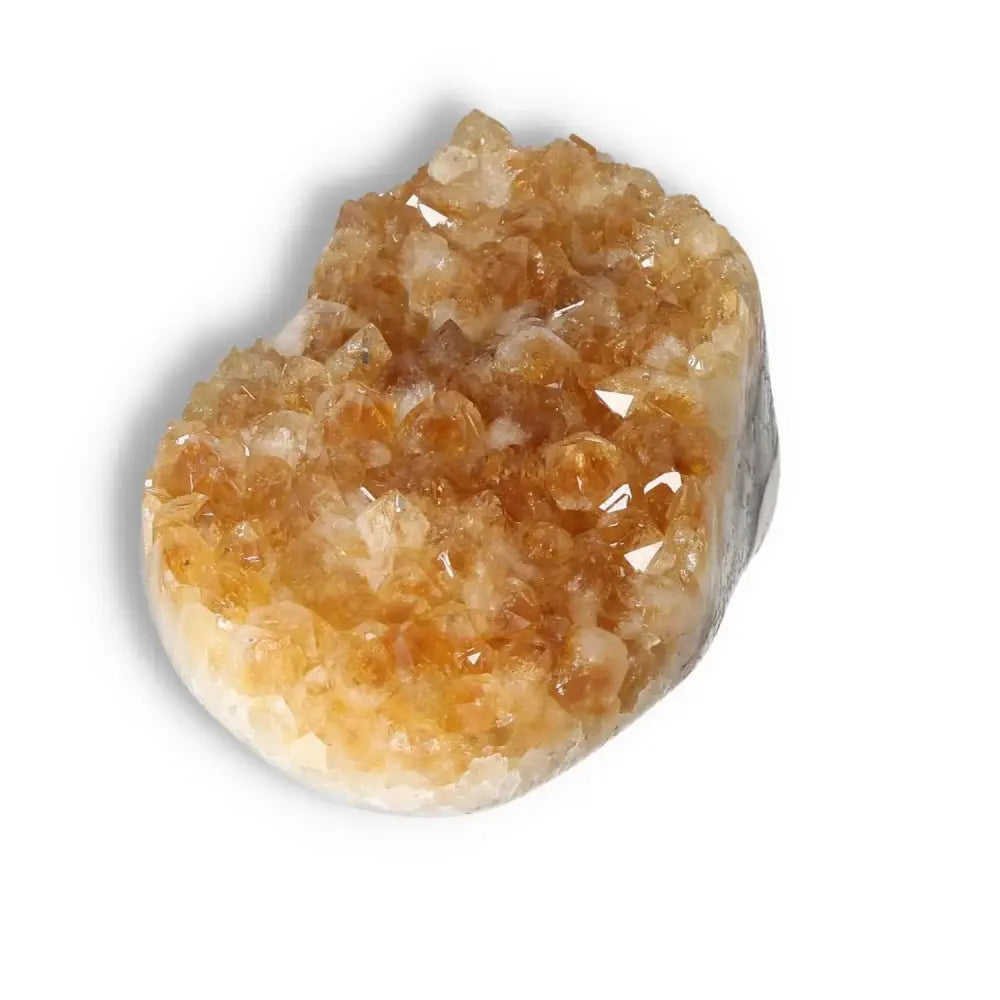 Citrine Druze crystal from Sylvia Crystals, showcasing vibrant orange hues and intricate formation.