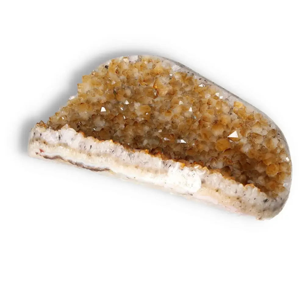 Citrine Druze crystal by Sylvia Crystals showcasing its vibrant yellow hues and sparkling surfaces, symbolizing vitality and inspiration.