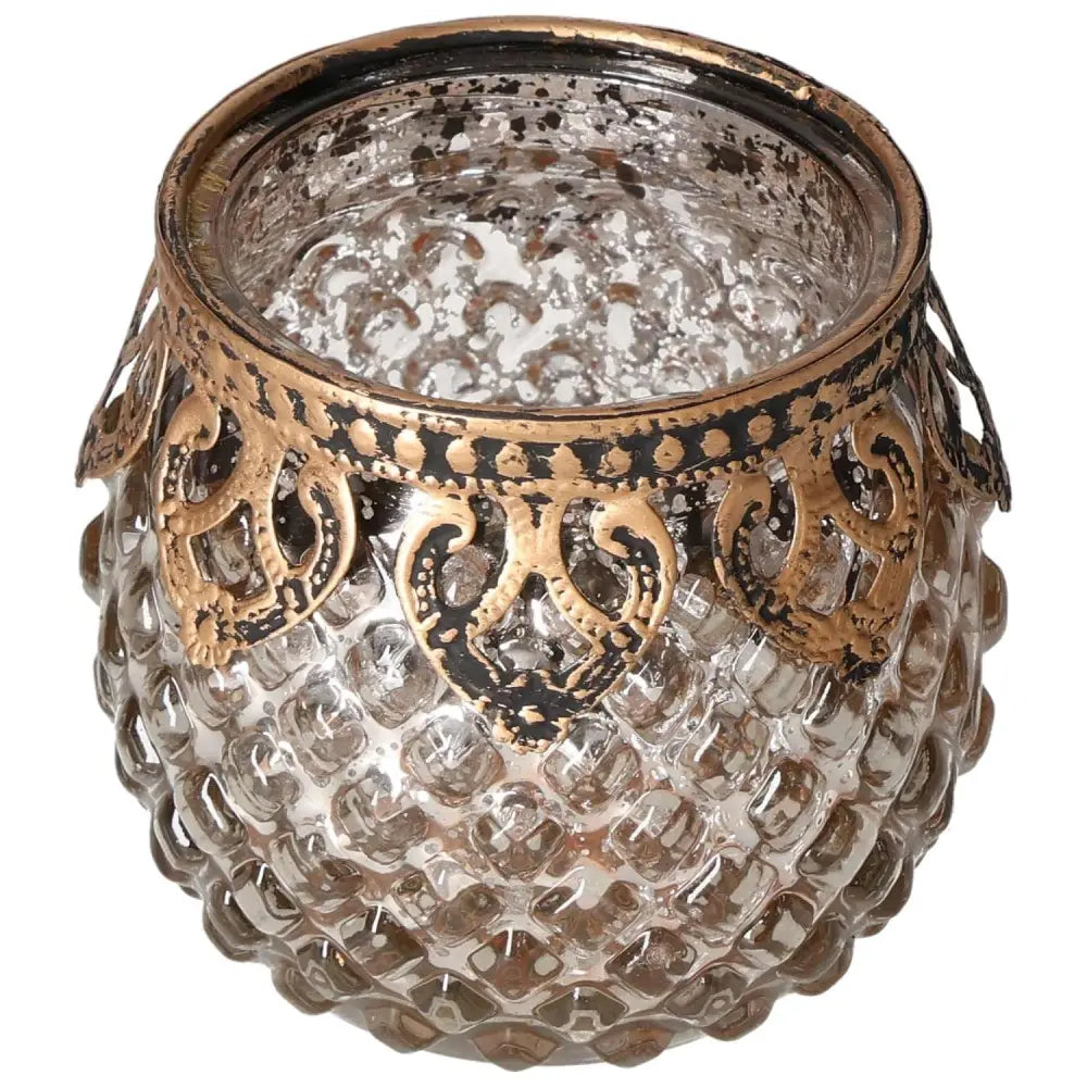 Glamorous decorative lantern with intricately patterned glass and ornate bronze detailing, perfect for adding elegance to any space.