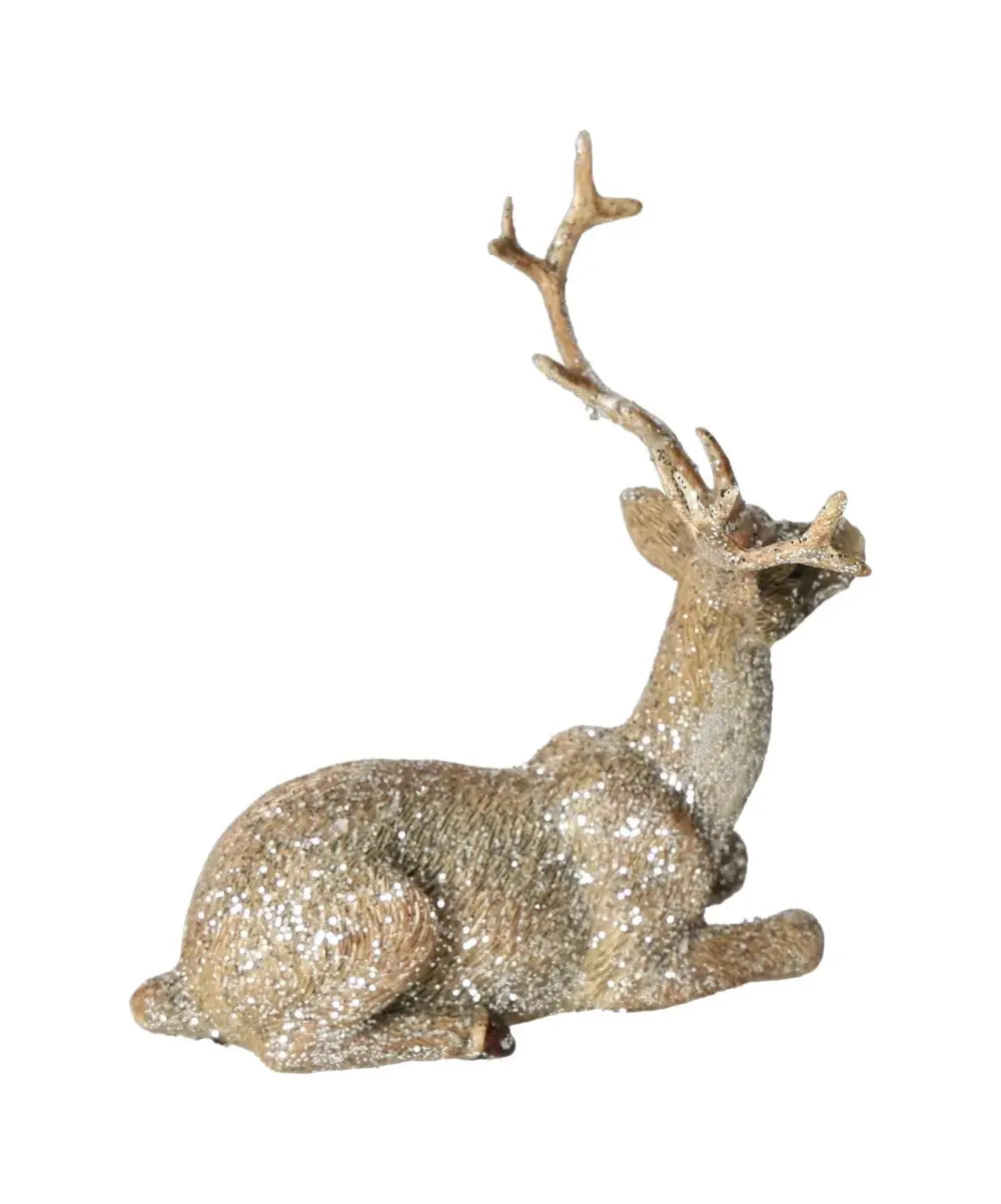 Elegant poly champagne deer with glitter, lying gracefully, embodying refined luxury and spiritual connection, crafted by Sylvia Crystals.