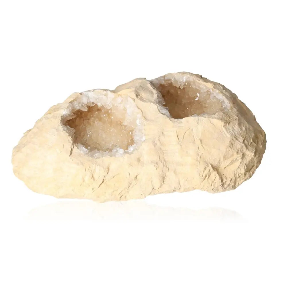 Dogtooth Calcite Geode XXL with tooth-like calcite crystals enhancing spiritual growth and energy in a natural geode.