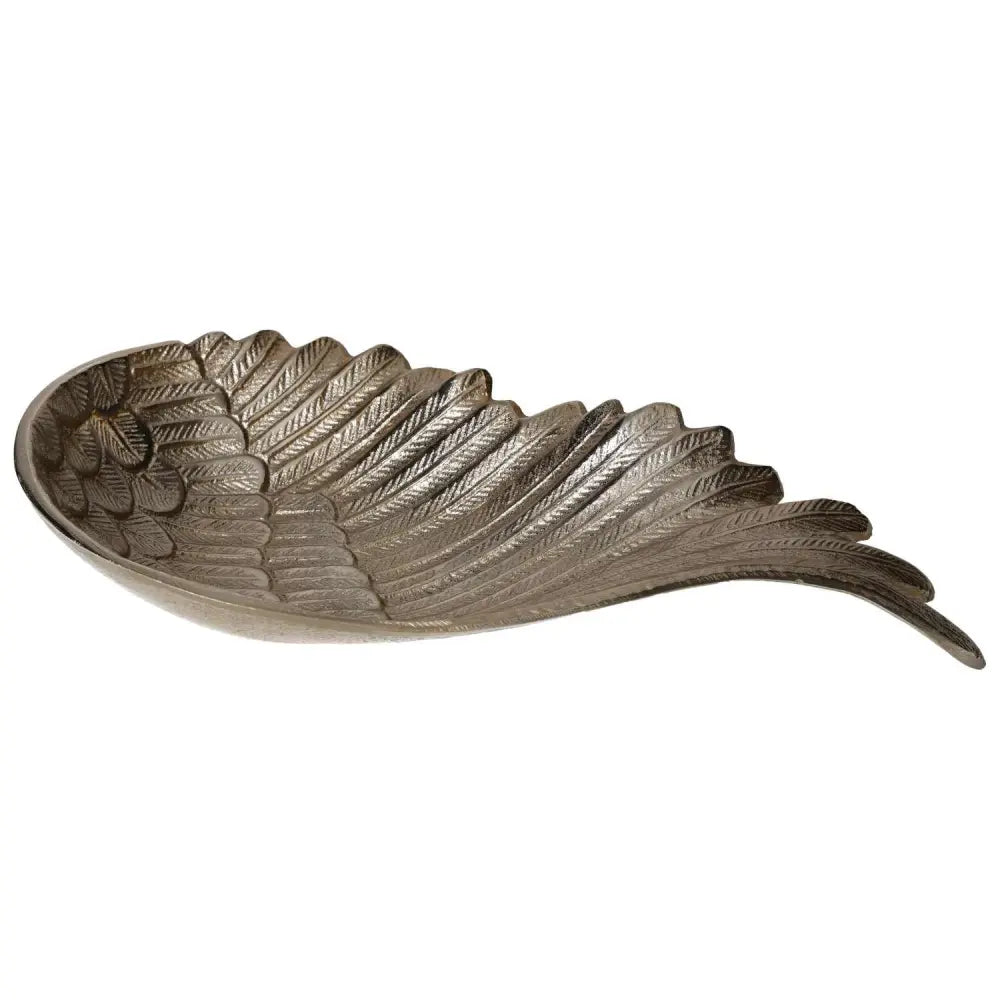 Gold metal bowl shaped like an angel wing, featuring detailed feather texture.