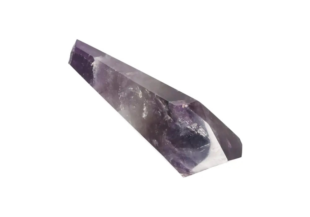 Elegant Amethyst Point crystal for calm, clarity, and spiritual protection in meditation and energy healing practices.