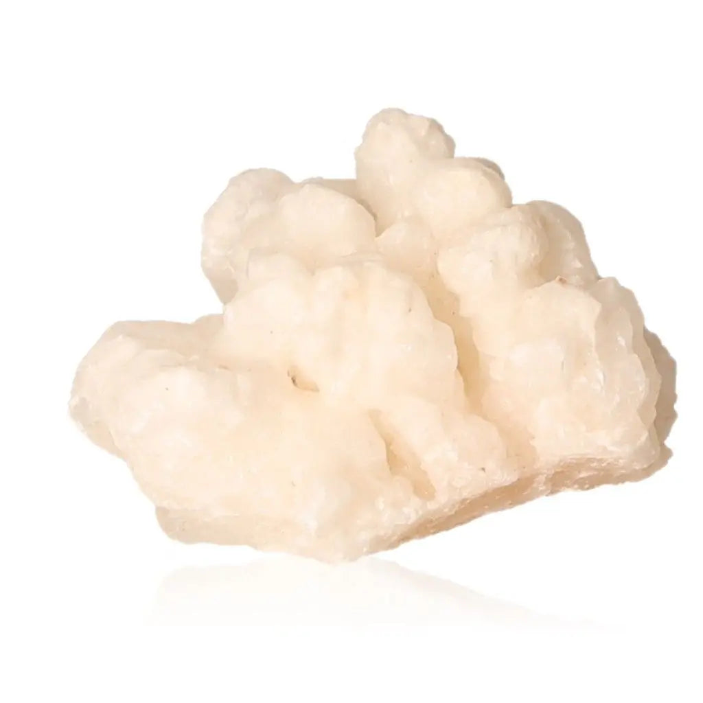 Ighoud Calcite Druze from Morocco showcasing natural shapes, warm earthy tones, and grounding energy for spiritual growth.