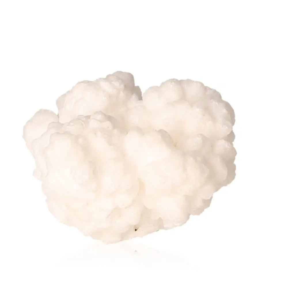 Ighoud Calcite Druze from Morocco showcasing natural white formations, a symbol of earthly stability and spiritual transformation.