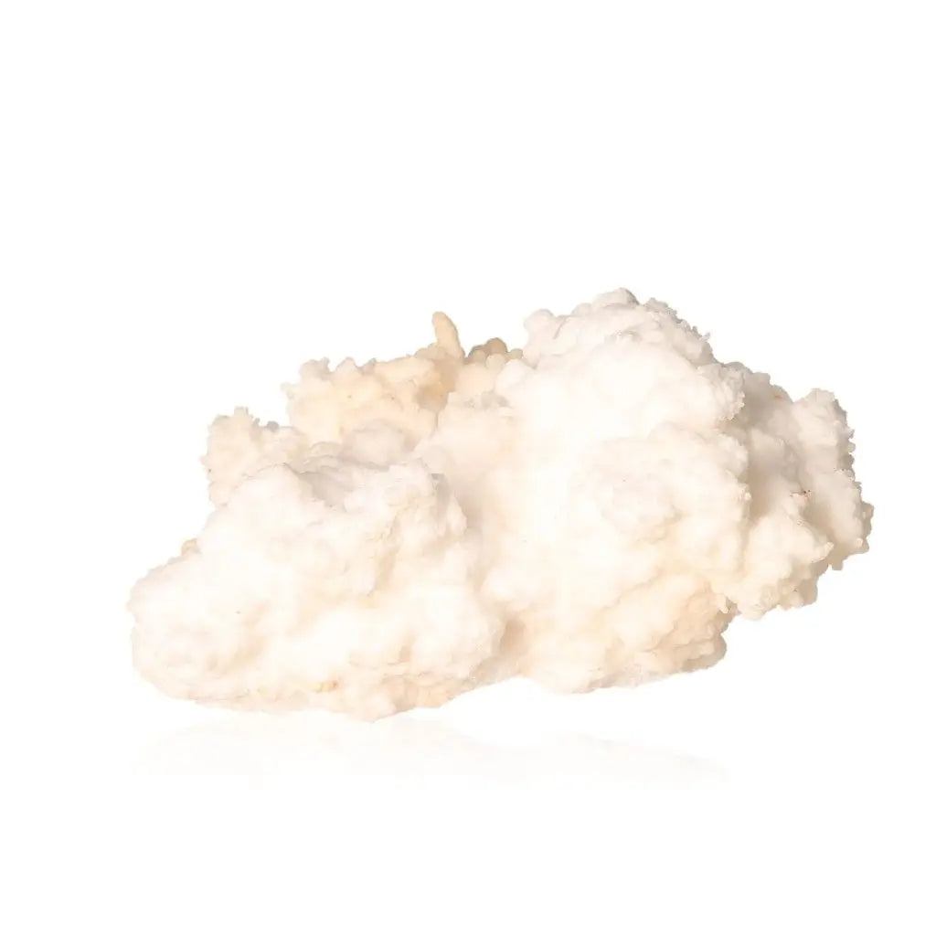 Ighoud Calcite Druze showcasing natural shapes and warm earthy tones, a mineral from Morocco symbolizing earth energy and stability.