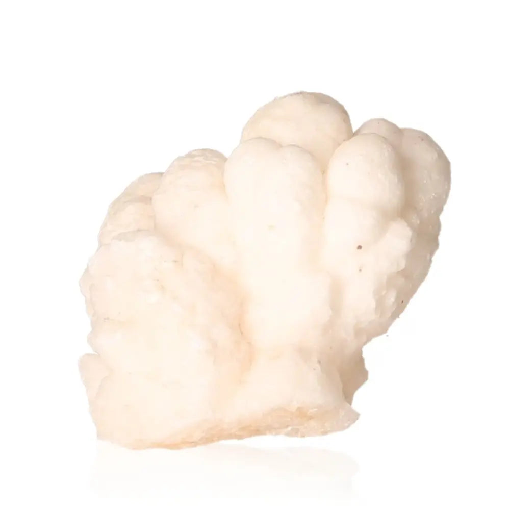 Ighoud Calcite Druze from Morocco showcasing natural shapes and earthy tones, known for grounding and spiritual growth qualities.