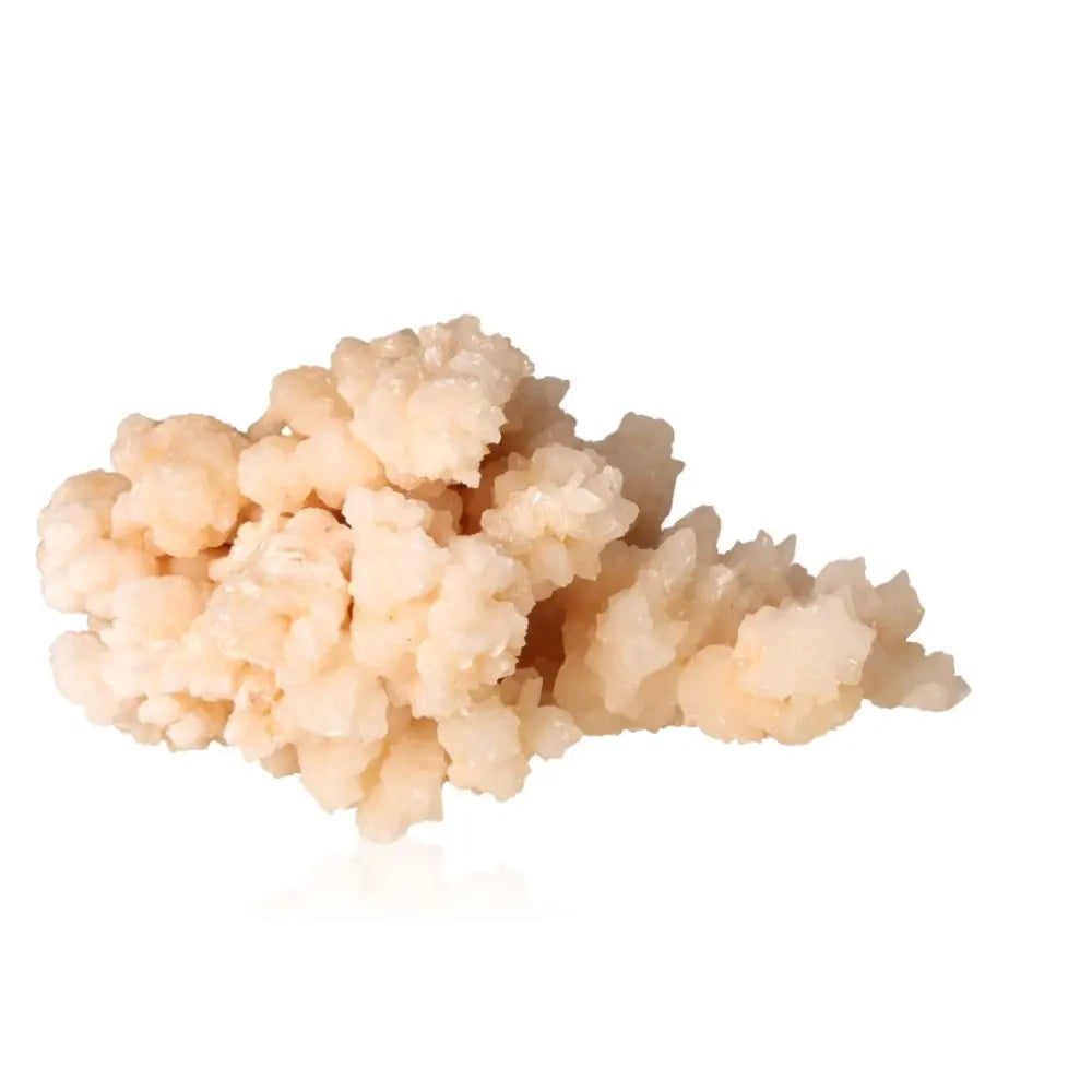 Ighoud Calcite Druze from Morocco featuring natural shapes and earthy tones, symbolizing grounding and spiritual transformation.