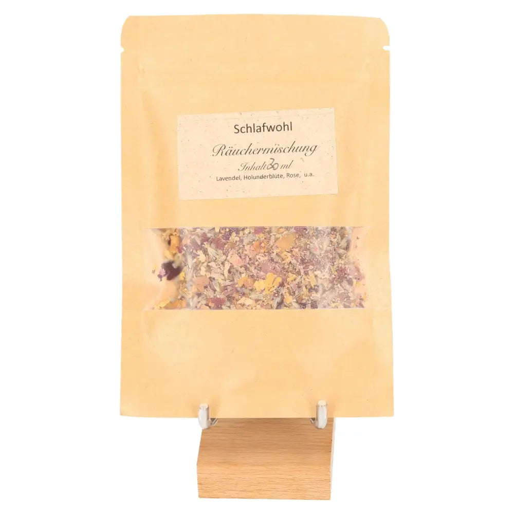 Package of "Restful Slumber" incense blend for calming and soothing atmosphere, containing lavender and elderflower, on a stand.