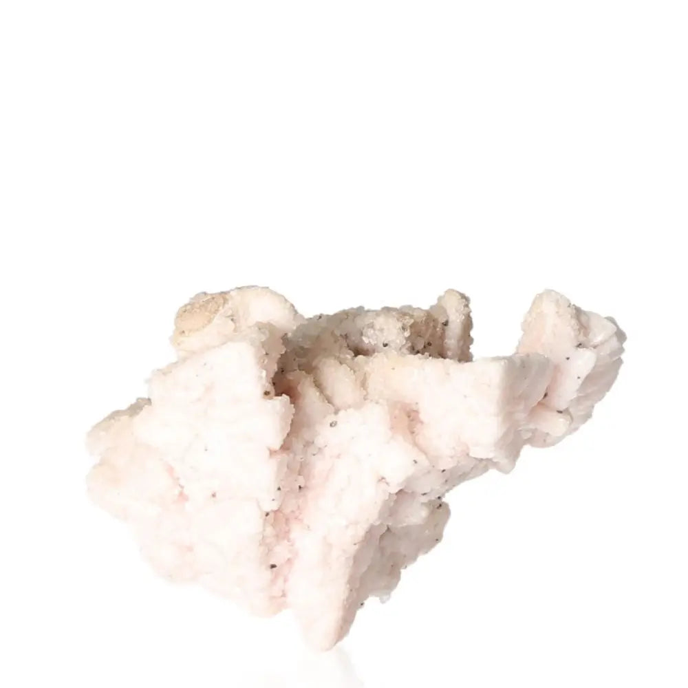 Soft pink Kutnahorite gemstone from Sylvia Crystals, known for emotional healing and connecting to the heart chakra.