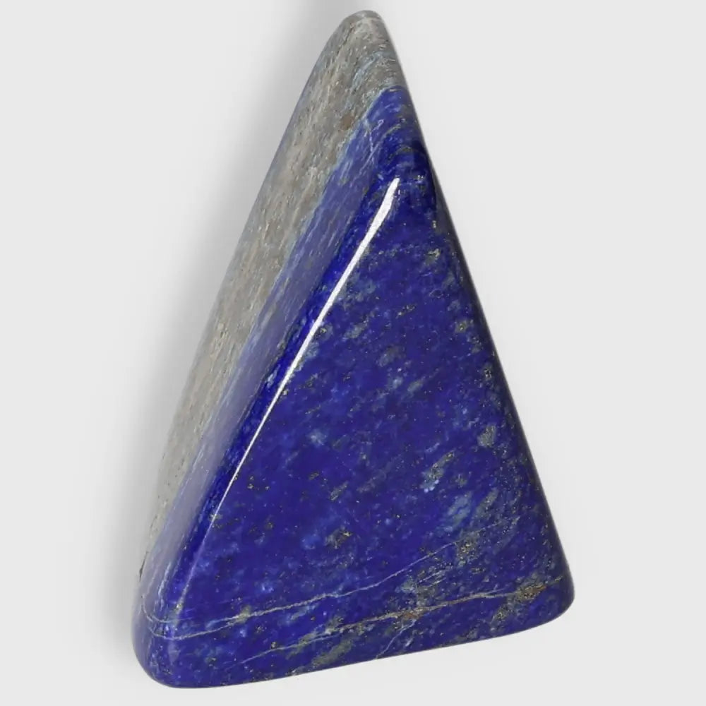 Lapis Lazuli Freeform from Pakistan displaying deep blue hues and golden pyrite, perfect for enhancing energy and focus.