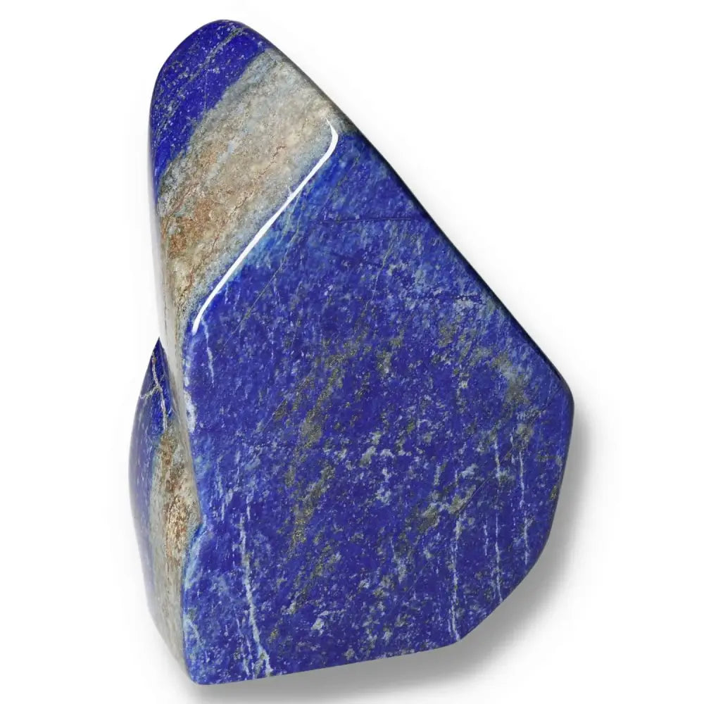 Lapis Lazuli freeform crystal with deep blue hues and golden pyrite flecks, sourced from Pakistan, enhancing energy and focus.