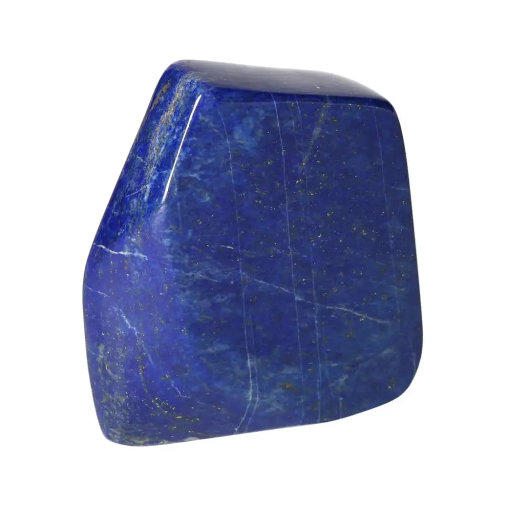 Deep blue Lapis Lazuli obelisk with golden pyrite flecks, symbolizing wisdom and inner power, from Pakistan.