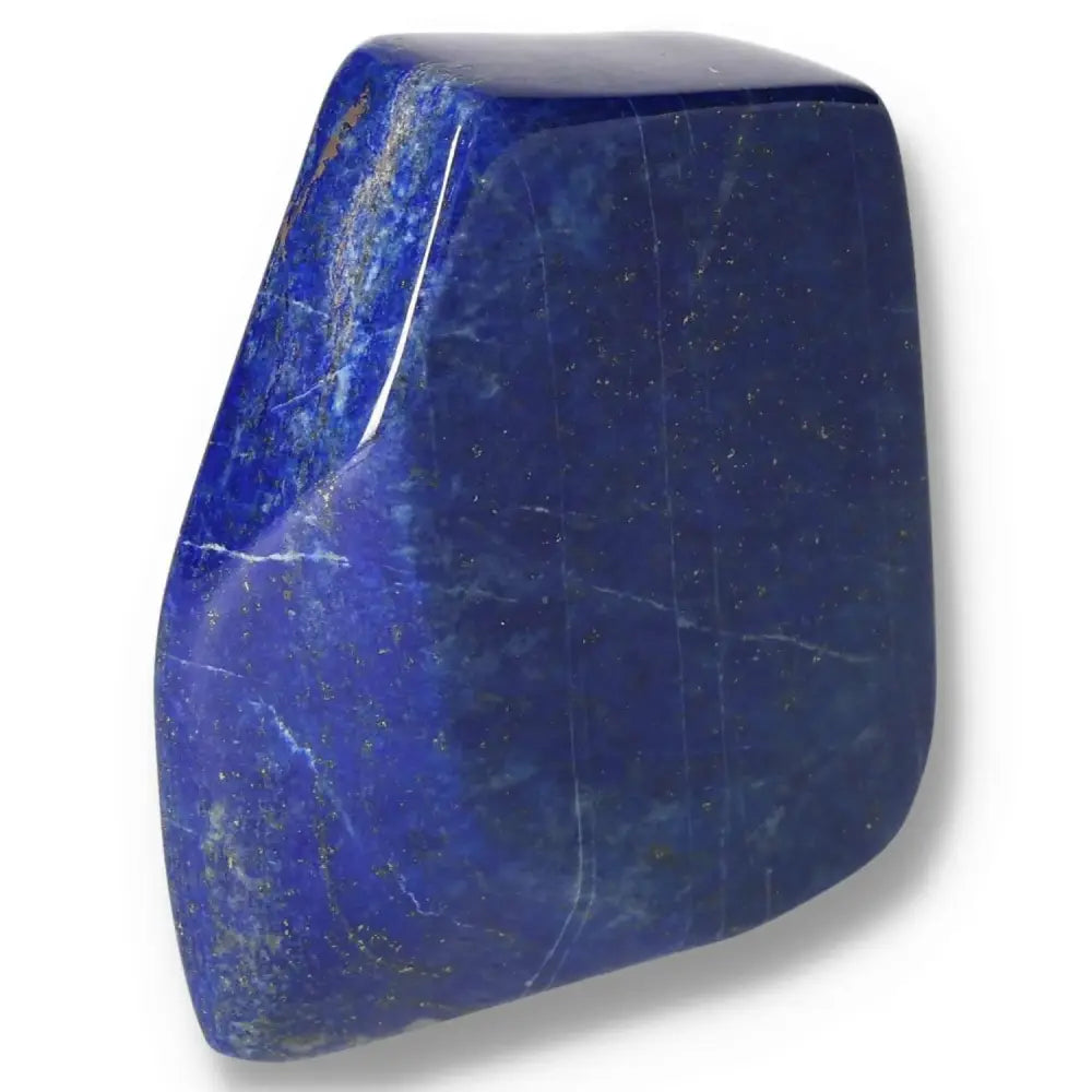 Deep blue Lapis Lazuli obelisk with golden pyrite flecks, symbolizing wisdom and inner power, handcrafted in Pakistan.