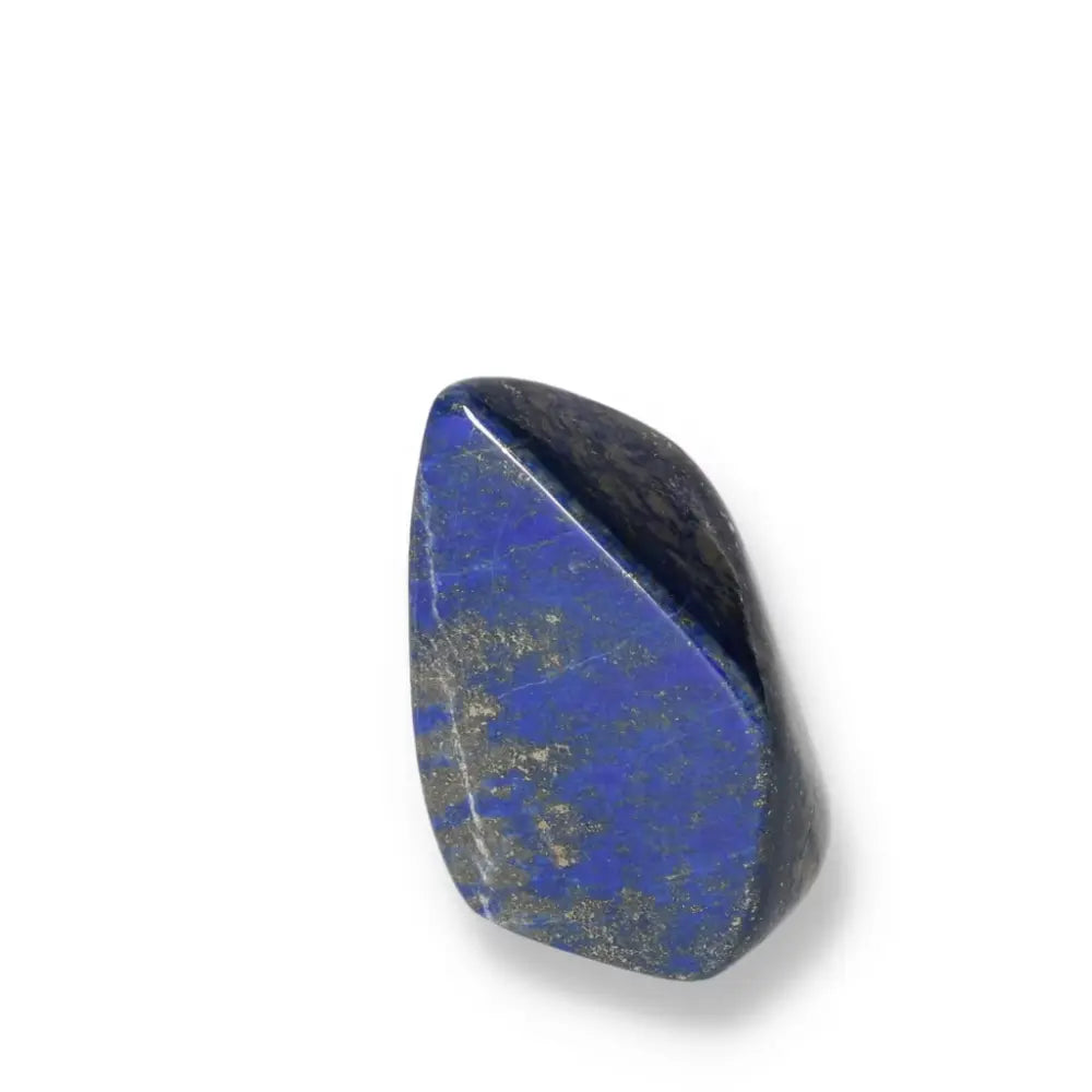 Lapis Lazuli Obelisk with deep blue hues and golden pyrite flecks from Pakistan, symbolizing wisdom and inner power.