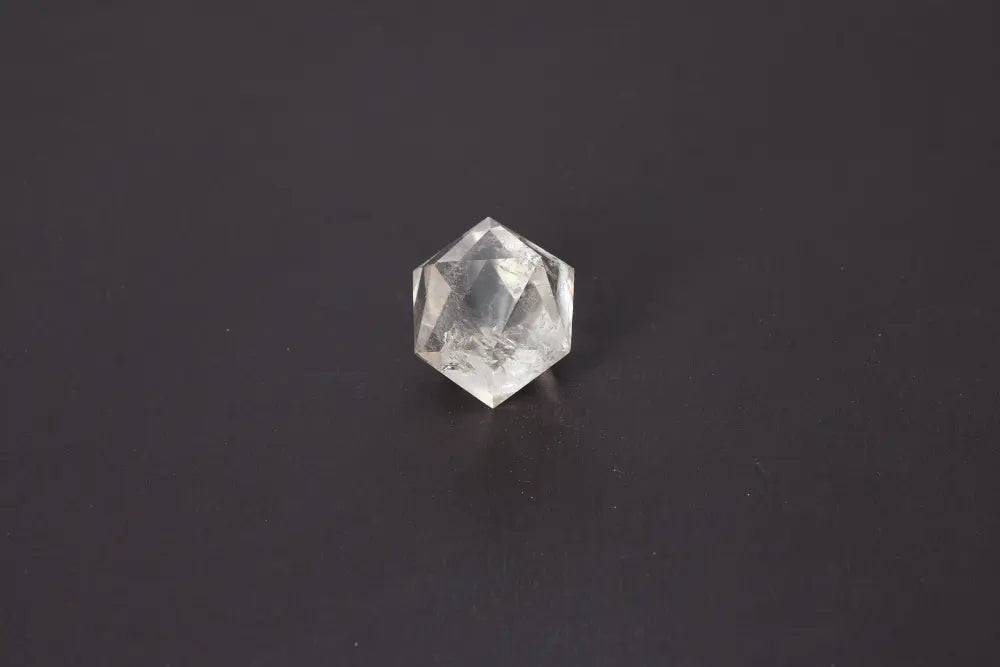 Lemurian Quartz Geometric Sphere 4 cm showcasing sacred geometry with ethereal clarity for spiritual connection and ancient wisdom.