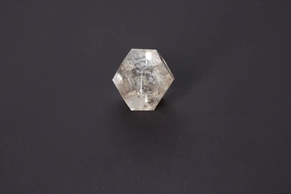 Lemurian Quartz Geometric Sphere showcasing sacred geometry and ancient wisdom on a dark background.