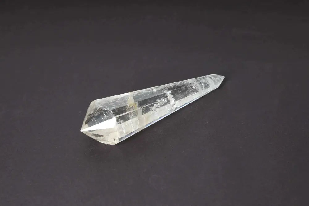 Lemurian Quartz Point crystal featuring horizontal striations, symbolizing ancient wisdom from the mythical Lemurian civilization.