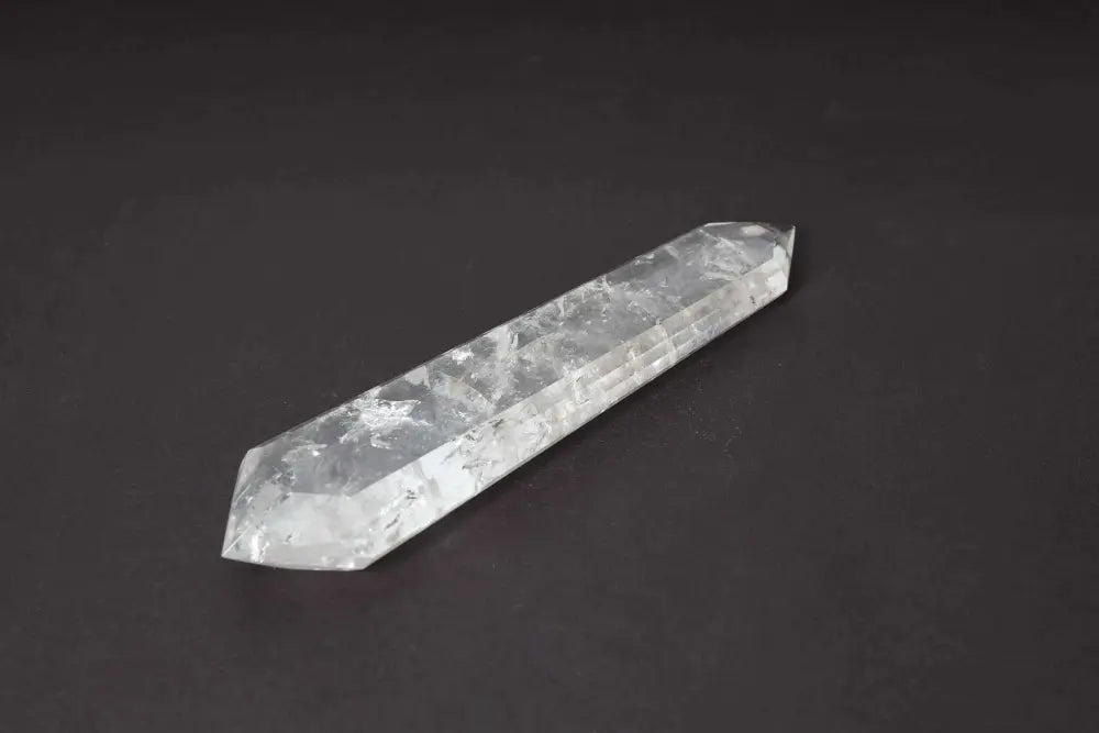 Lemurian Quartz Point with distinct horizontal striations, believed to carry ancient wisdom from the mythical Lemurian civilization.