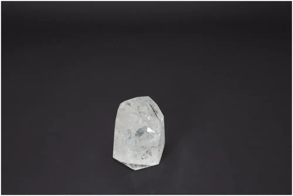 Lemurian Quartz Obelisk with unique crystal properties for spiritual and energetic support on a dark background.