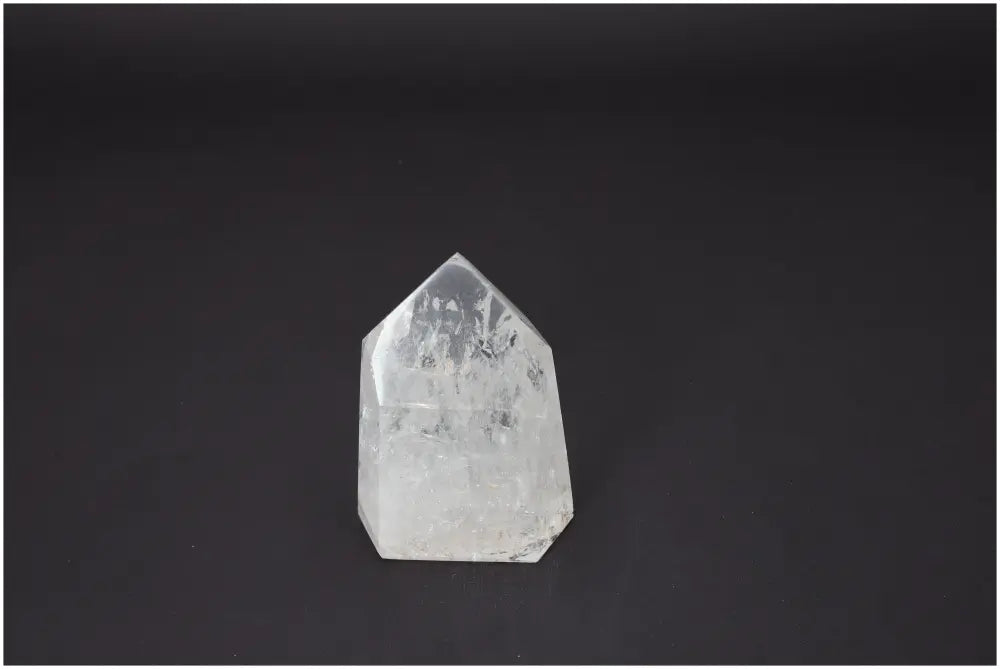 Lemurian Quartz Obelisk with distinct energetic properties, supports chakras and zodiac signs, on black background