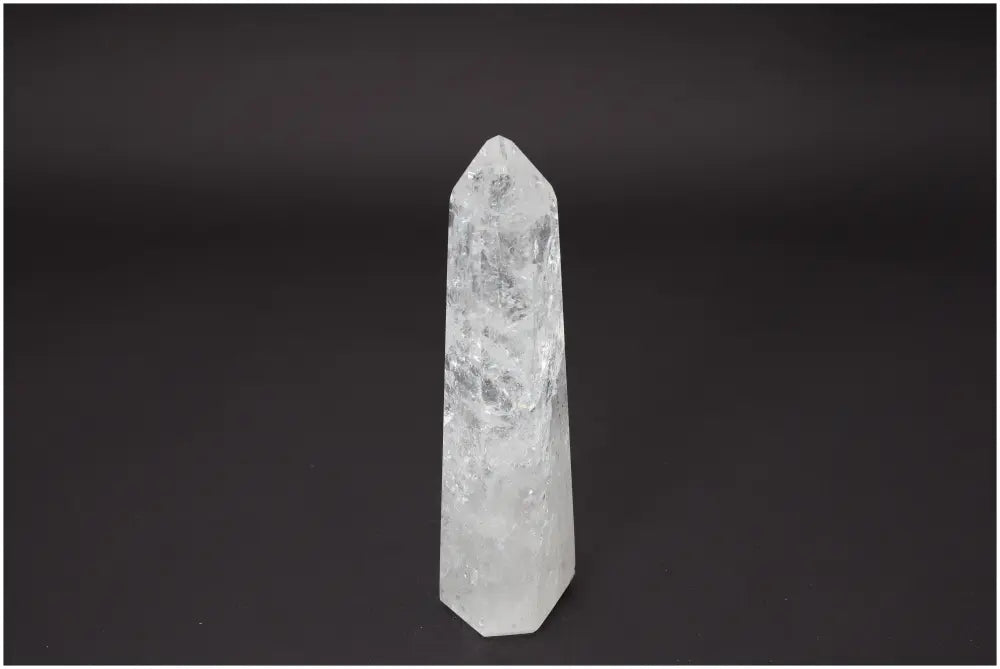Lemurian Quartz Obelisk with unique properties for chakra healing and spiritual energy balancing.
