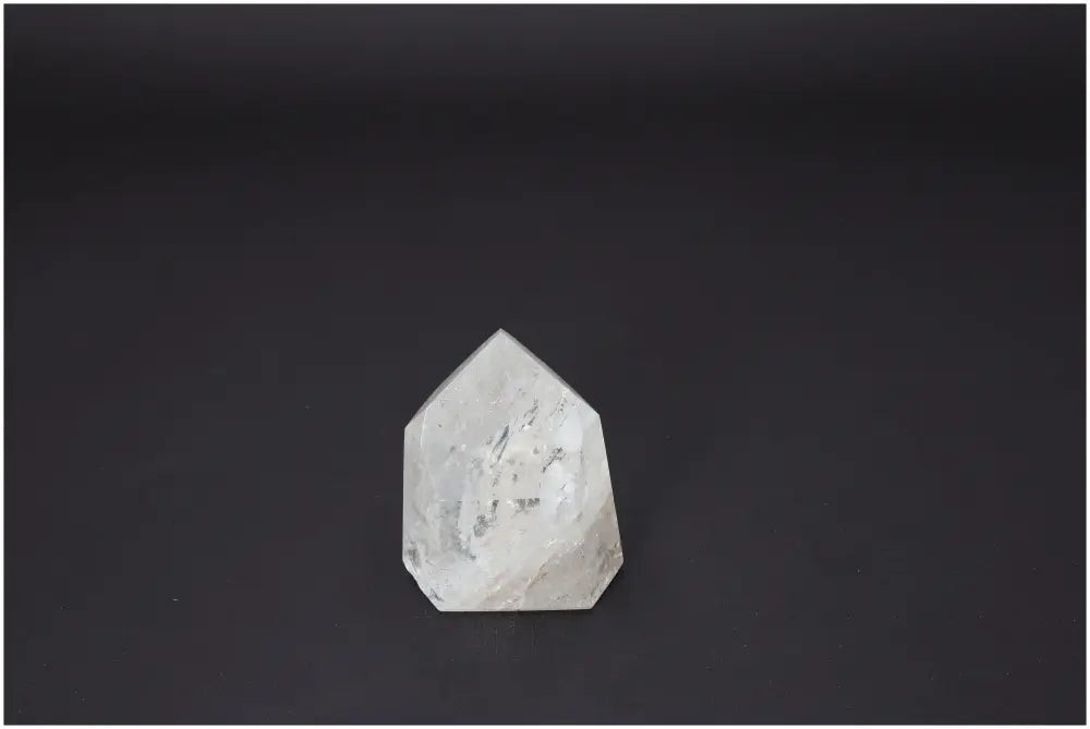 Lemurian Quartz Obelisk featuring unique natural elements and spiritual properties, enhancing chakra and zodiac energy alignment.