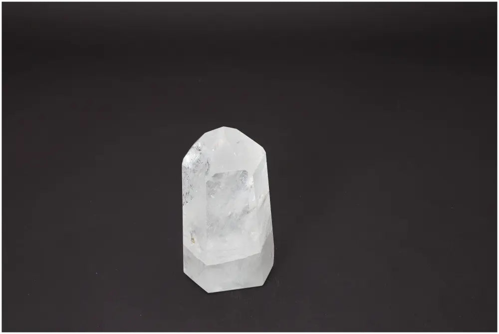Lemurian Quartz Obelisk, unique crystal for chakra balancing, supports energetic and spiritual needs with clear, polished facets.