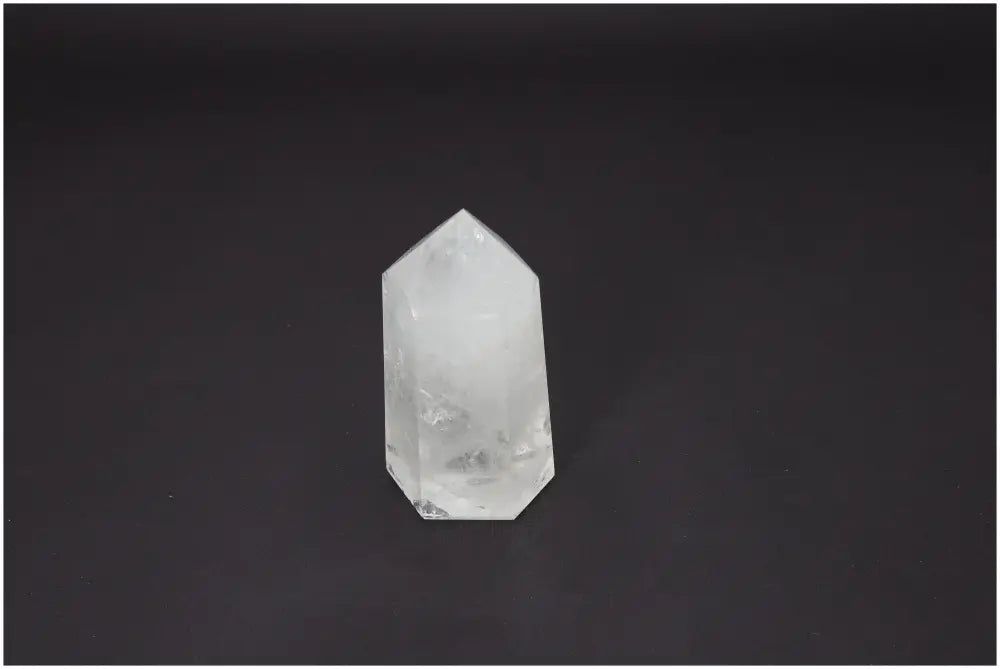 Lemurian Quartz Obelisk crystal with unique chakra and zodiac properties, enhancing body and soul energy. Ideal for spiritual practices.