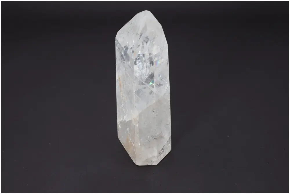 Lemurian Quartz Obelisk with spiritual properties, linked to chakras and zodiac signs. Enhance energy and well-being with this crystal.