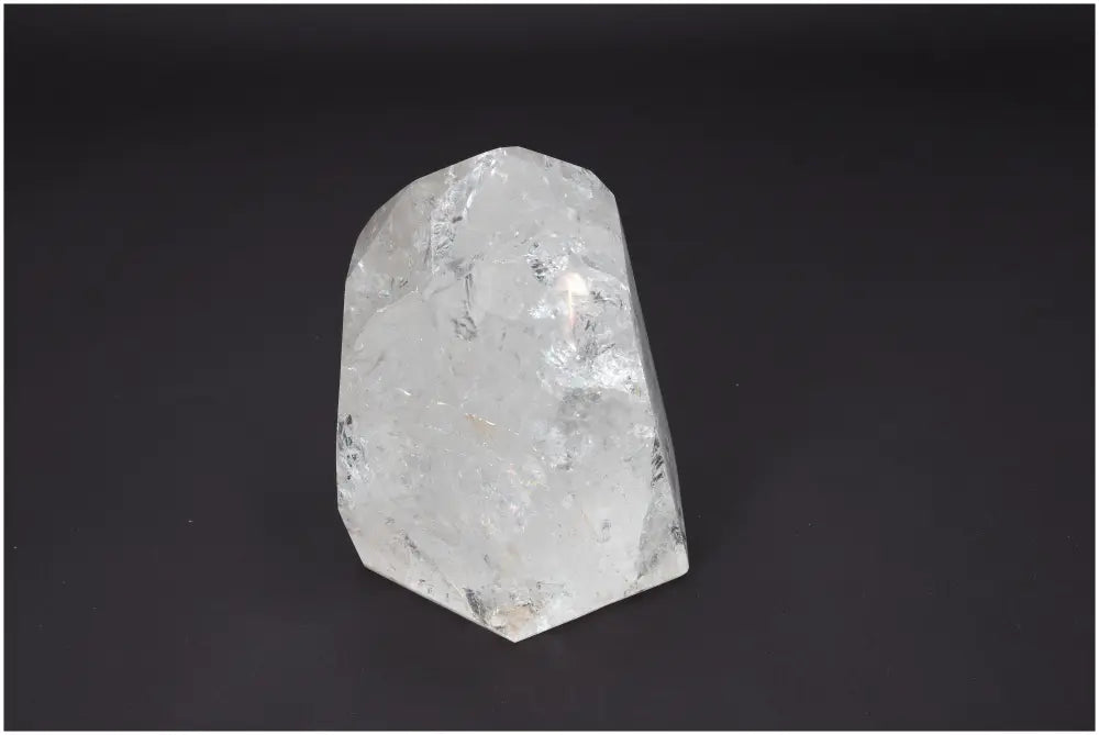 Lemurian Quartz Obelisk showcasing clear crystal properties for spiritual and energetic enhancement.